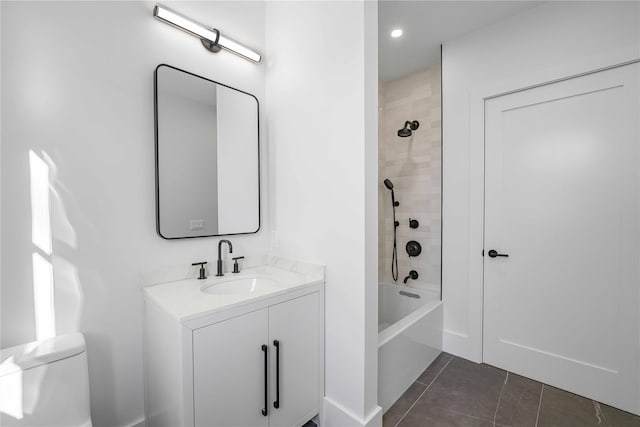 full bathroom featuring shower / tub combination, vanity, toilet, and tile patterned floors