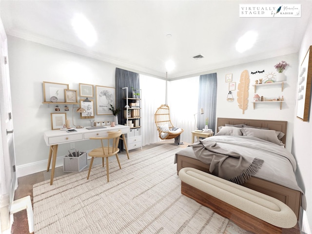 bedroom featuring visible vents, crown molding, and baseboards