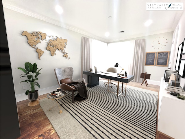 home office with ornamental molding, wood finished floors, visible vents, and baseboards