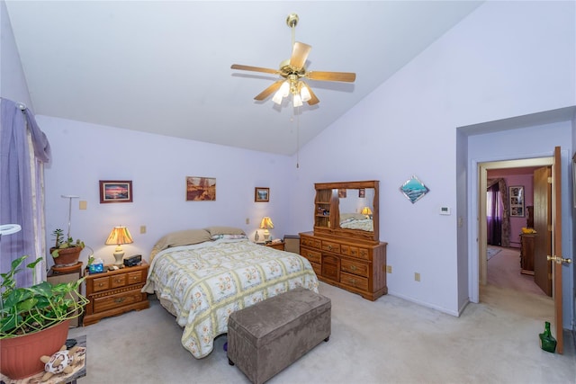 bedroom featuring light carpet, baseboards, high vaulted ceiling, and a ceiling fan