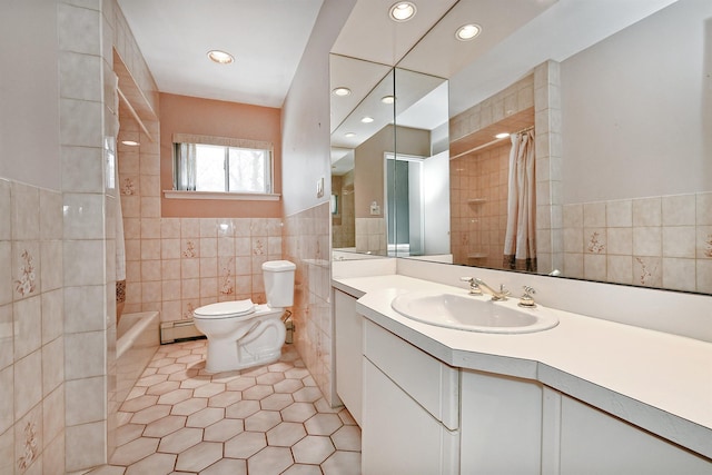 bathroom featuring vanity, baseboard heating, tile walls, toilet, and tile patterned floors