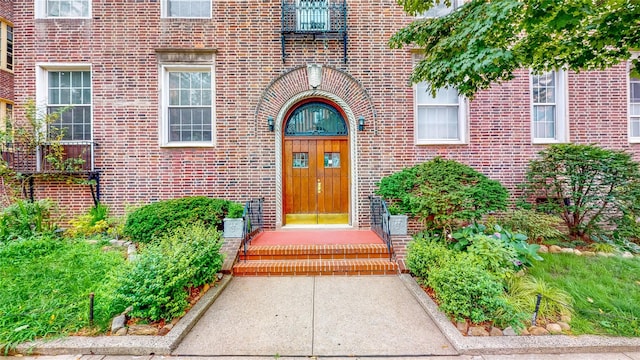 entrance to property with brick siding