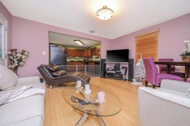 living room featuring light wood finished floors