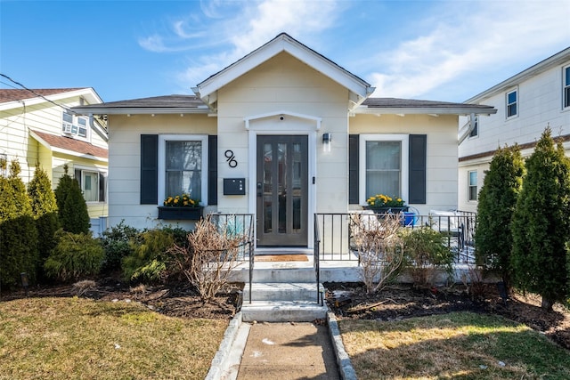 bungalow featuring a porch