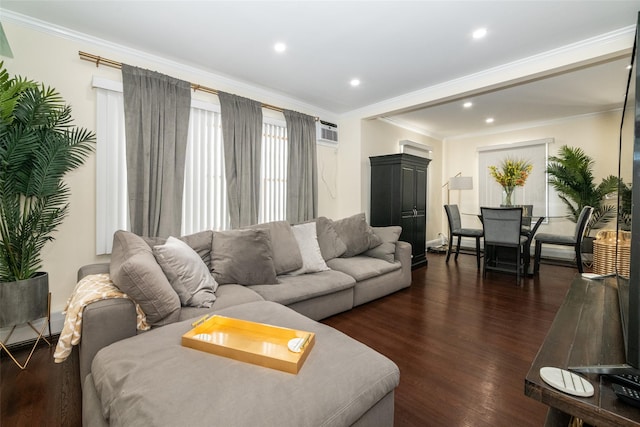 living area featuring an AC wall unit, ornamental molding, dark wood-style flooring, and recessed lighting