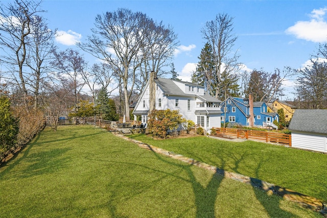 view of yard featuring an outbuilding and a fenced backyard