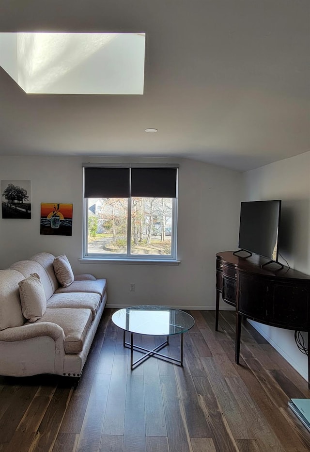 living room featuring dark wood finished floors and baseboards