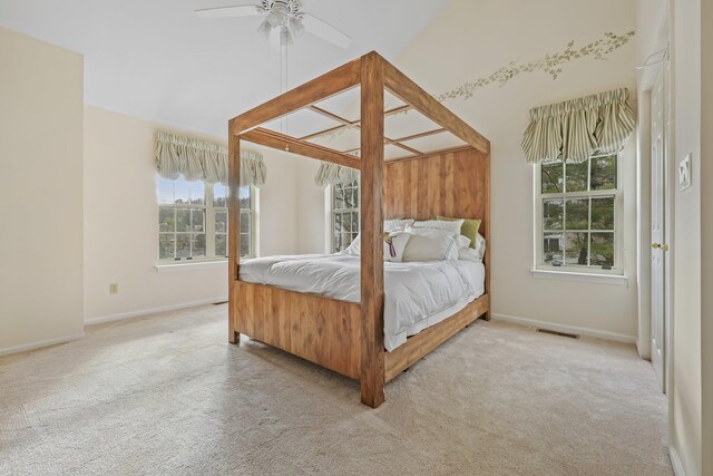 bedroom featuring baseboards, visible vents, and carpet