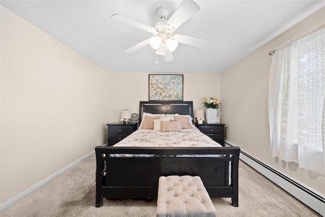 carpeted bedroom featuring a ceiling fan, baseboards, and baseboard heating