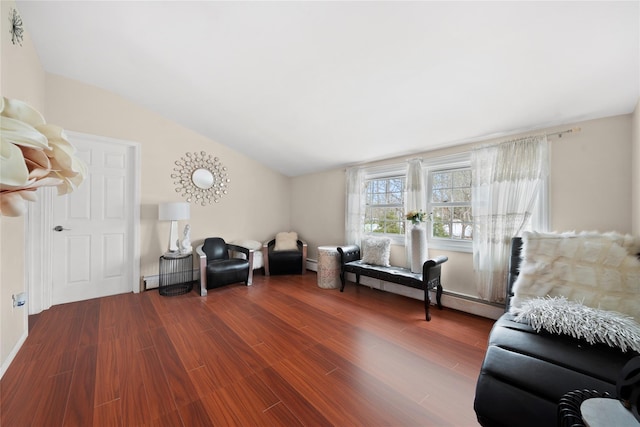 living area featuring lofted ceiling and wood finished floors