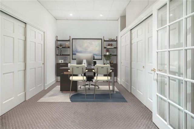 carpeted home office featuring a paneled ceiling, baseboards, and recessed lighting