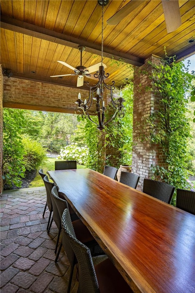 view of patio / terrace featuring outdoor dining area and a ceiling fan