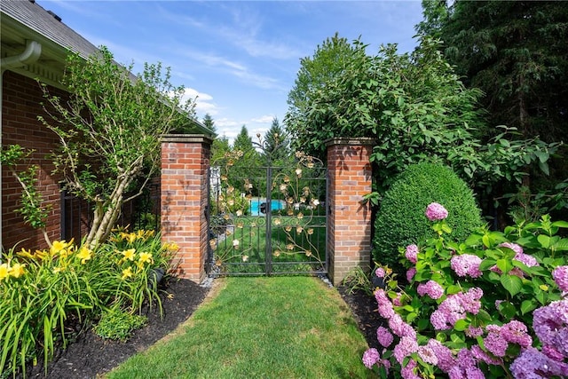 view of gate featuring fence