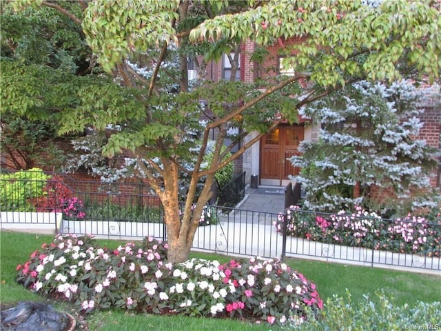 142 Garth Rd Unit 1P, Scarsdale, NY 10583 - obstructed view of property with brick siding