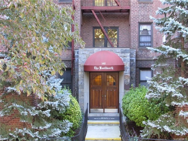 142 Garth Rd Unit 1P, Scarsdale, NY 10583 - doorway to property with brick siding