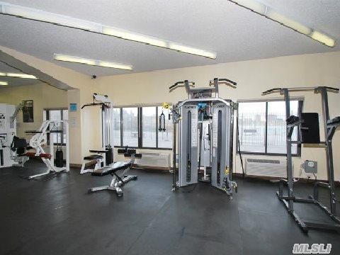 workout area featuring plenty of natural light and a textured ceiling