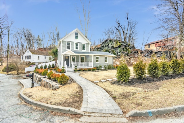 view of front of property featuring board and batten siding and covered porch