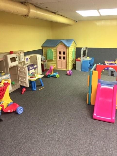 playroom featuring carpet flooring