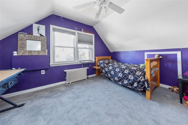 bedroom featuring carpet floors, radiator, vaulted ceiling, and ceiling fan