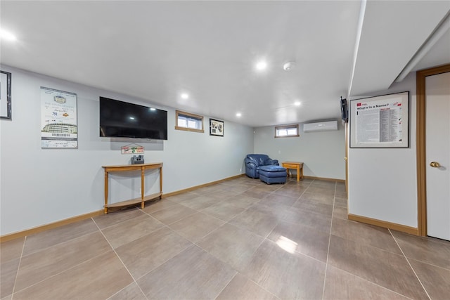 interior space with tile patterned flooring, baseboards, an AC wall unit, and recessed lighting