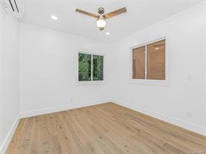 empty room featuring a ceiling fan, baseboards, wood finished floors, and recessed lighting