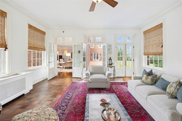57 Old Orchard Ln, Scarsdale, NY 10583 - living room featuring radiator, ceiling fan, ornamental molding, french doors, and baseboards