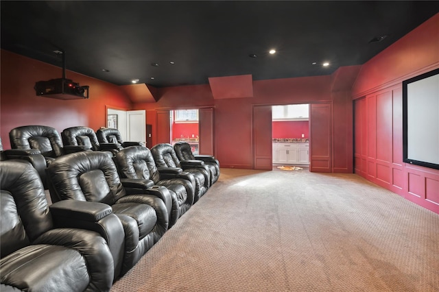 57 Old Orchard Ln, Scarsdale, NY 10583 - home theater featuring light colored carpet, lofted ceiling, and recessed lighting