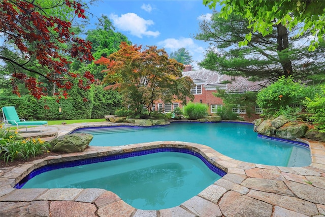 57 Old Orchard Ln, Scarsdale, NY 10583 - outdoor pool featuring a patio area and an in ground hot tub