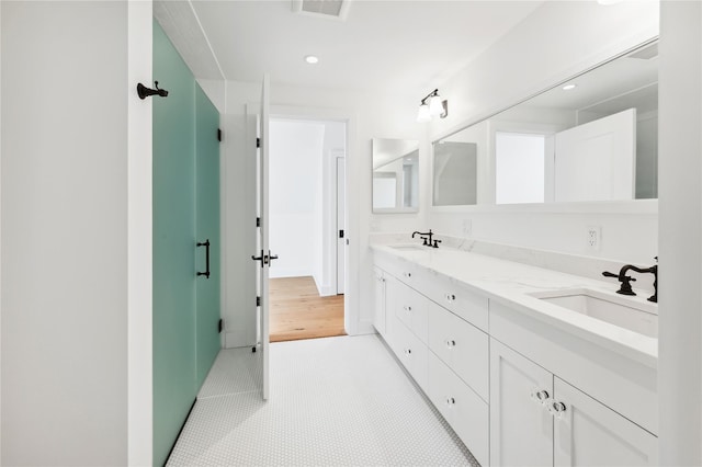 57 Old Orchard Ln, Scarsdale, NY 10583 - bathroom featuring a sink, visible vents, and recessed lighting