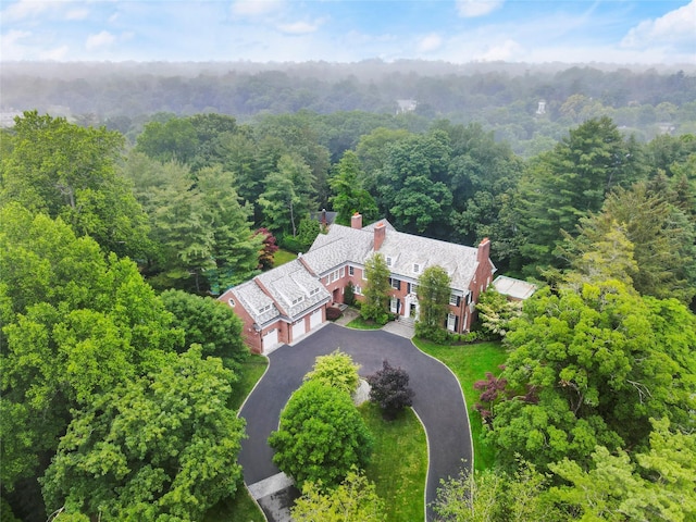 57 Old Orchard Ln, Scarsdale, NY 10583 - drone / aerial view featuring a wooded view