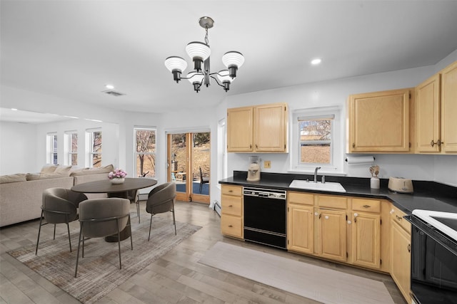 kitchen with light brown cabinets, a sink, visible vents, black dishwasher, and dark countertops