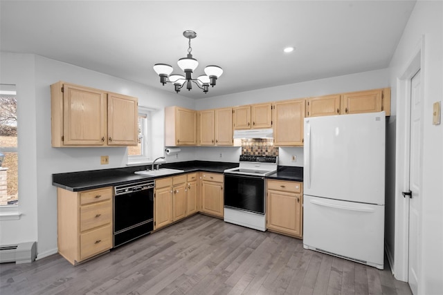 kitchen with dishwasher, light brown cabinetry, range with electric cooktop, and freestanding refrigerator