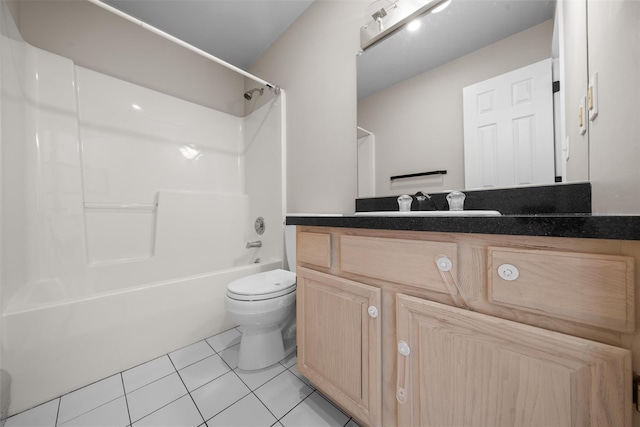 full bathroom featuring shower / tub combination, vanity, toilet, and tile patterned floors