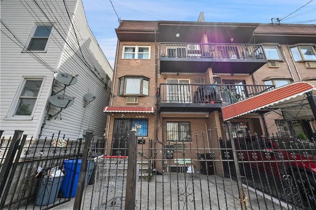 view of property featuring a fenced front yard