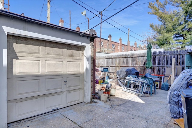 garage featuring fence