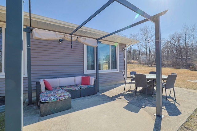 view of patio with a lanai, an outdoor hangout area, and outdoor dining area