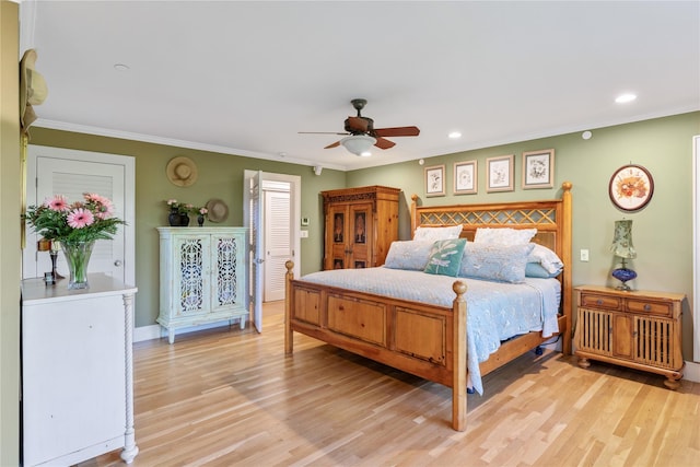 bedroom with baseboards, a ceiling fan, light wood-style flooring, crown molding, and recessed lighting