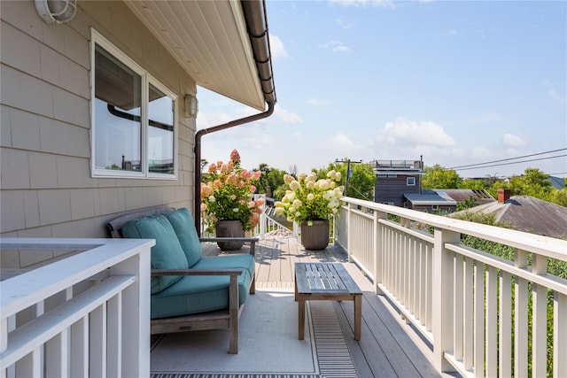 view of wooden balcony with a deck