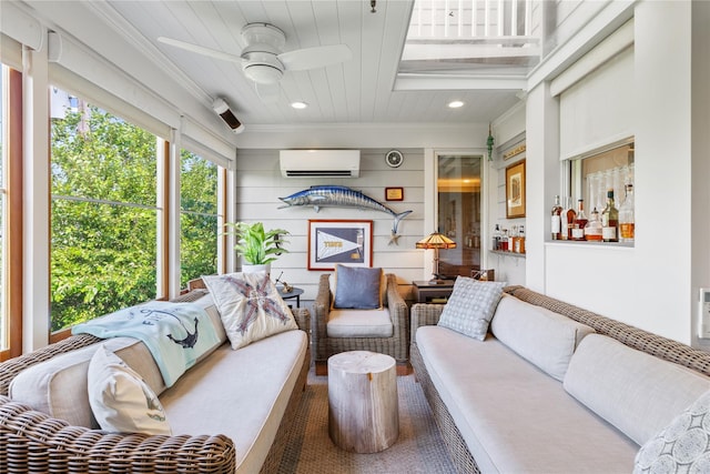 sunroom with ceiling fan and a wall mounted AC