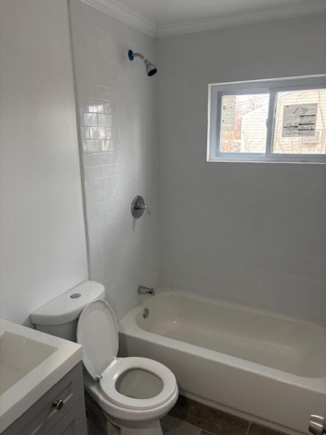 bathroom featuring ornamental molding, tub / shower combination, vanity, and toilet