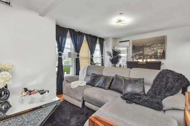 living room with beam ceiling