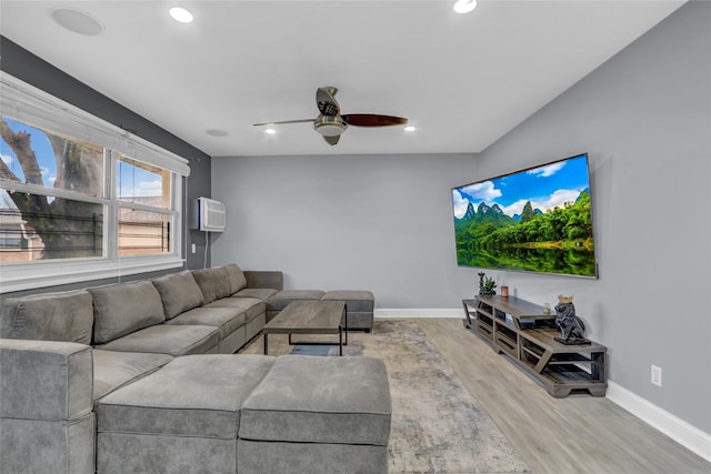 living room with ceiling fan, recessed lighting, wood finished floors, and baseboards