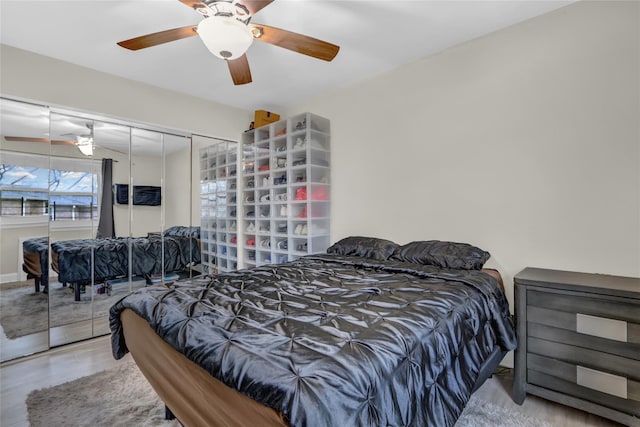 bedroom featuring a closet and a ceiling fan