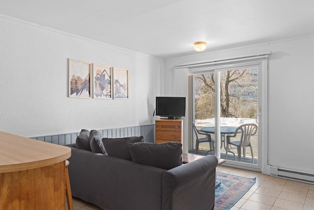 living room with light tile patterned flooring, crown molding, and baseboard heating