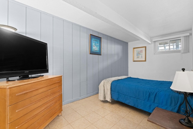 bedroom with light tile patterned flooring