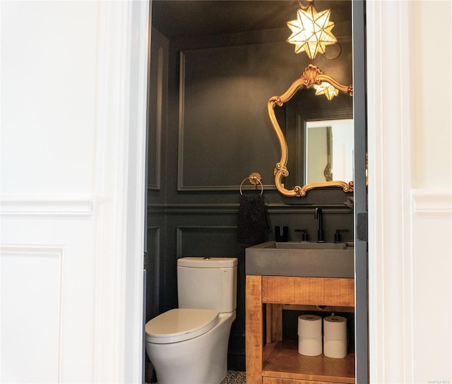 bathroom with vanity and toilet