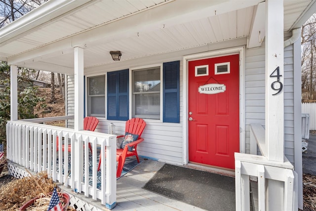 entrance to property featuring covered porch