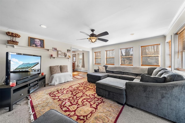 living room featuring a baseboard radiator, ceiling fan, and ornamental molding