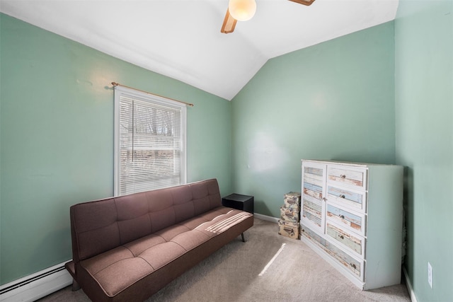 sitting room featuring baseboards, ceiling fan, vaulted ceiling, baseboard heating, and carpet flooring