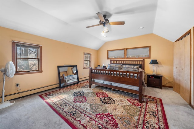 bedroom featuring carpet flooring, lofted ceiling, and a baseboard radiator